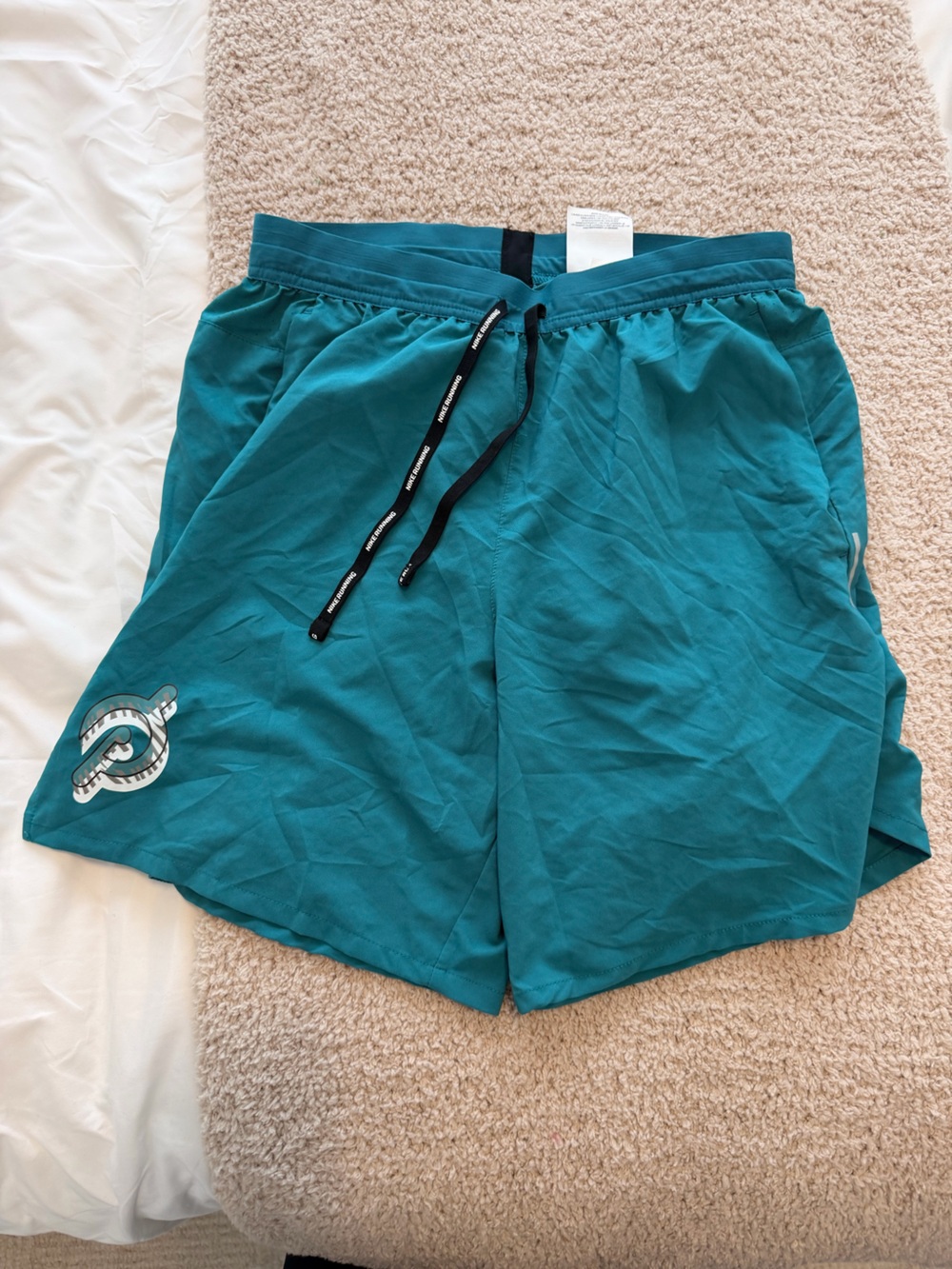 Nike Peloton Teal Athletic Shorts with Drawstring and Logo